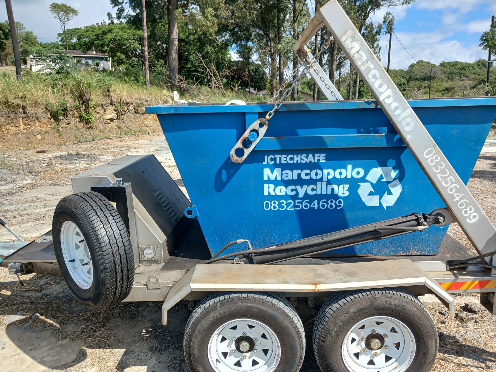 MarcoPolo Recycling branded blue skip trailer ready for service